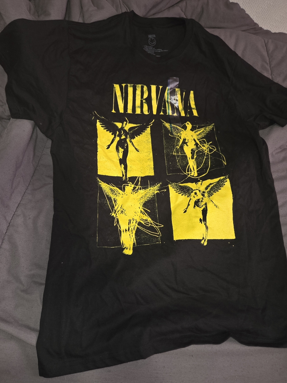 NIRVANA Black Short Sleeve Tee with Yellow Angel Grid Graphic